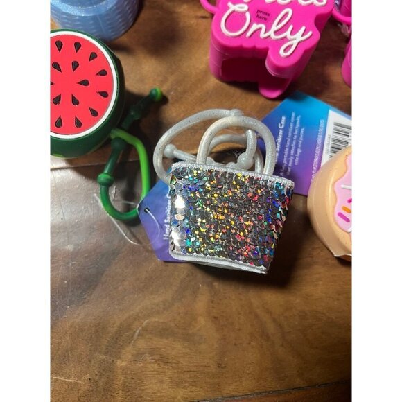 Lot of 6 hand sanitizer cases.  Good vibes, hat, bag, donut, melon - Picture 4 of 6